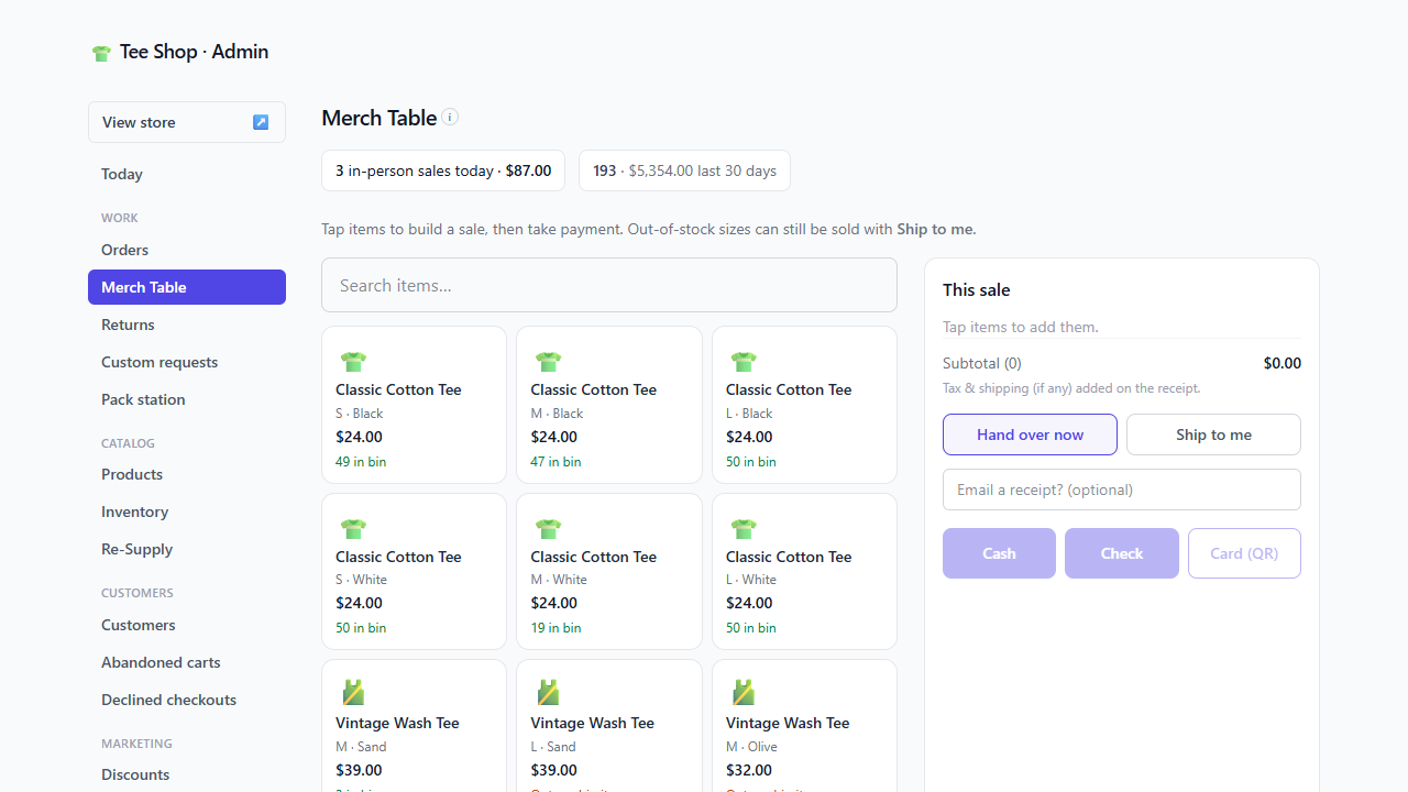 Merch Table sell screen with a product grid, sale total, and Hand over now / Ship to me buttons